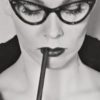 night frights product vampira wearing cat eye glasses